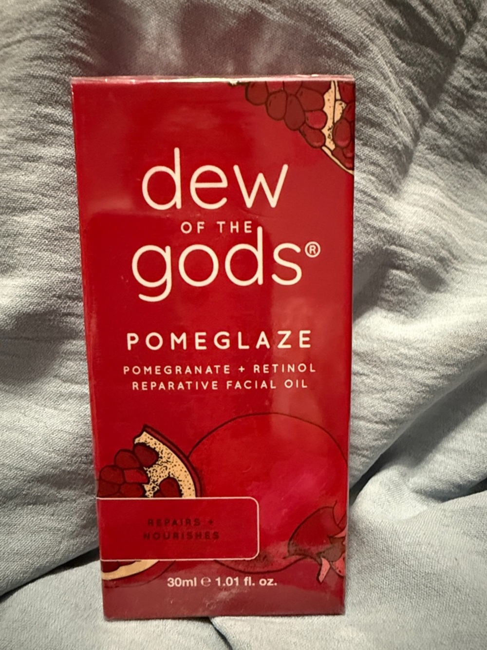 Dew of the Gods Pomeglaze Reparative Facial Oil - Red Packaging